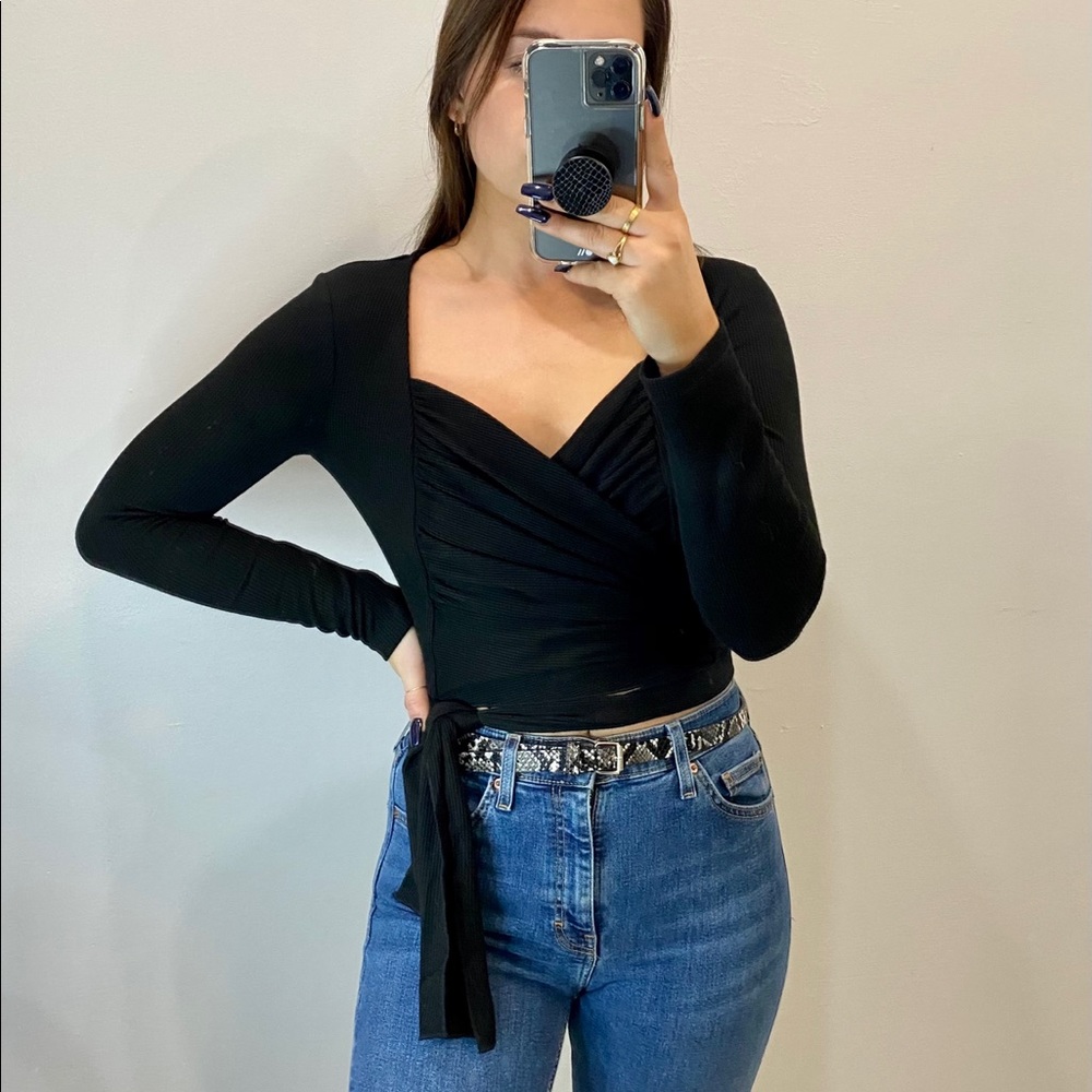 Versatile black wrap top